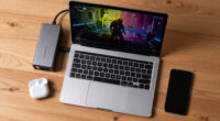 M5 Max MacBook Pro paired with RTX 5090 in an eGPU dock — runs Cyberpunk 2077 at over 100 FPS at max settings with frame generation